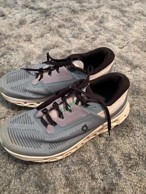 On Running Light Blue and Black Running Sneakers